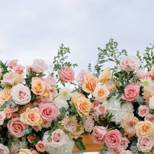 Golden Coral Elevated Floral Arrangement